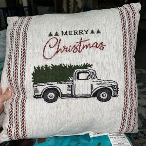 Merry Christmas pillow with truck on it